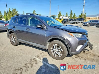 Czwarte zdjęcie samochodu z boku: 2017 TOYOTA RAV4 LE VIN:JTMZFREV2HJ108169 - miniatura
