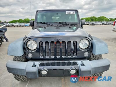 Piąte zdjęcie samochodu w środku: 2016 JEEP WRANGLER UNLIMITED SPORT VIN:1C4BJWDG7GL103053 - miniatura