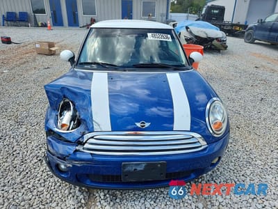 Piąte zdjęcie samochodu w środku: 2009 MINI COOPER VIN:WMWMF33549TU70128 - miniatura