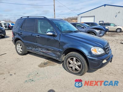 Czwarte zdjęcie samochodu z boku: 2003 MERCEDES-BENZ ML 500 VIN:4JGAB75E13A377300 - miniatura