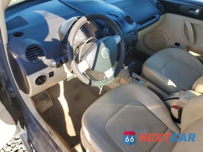 Zdjęcie 8 z 12 samochodu: 2003 VOLKSWAGEN NEW BEETLE GLS VIN:3VWCK21YX3M317841 - miniatura