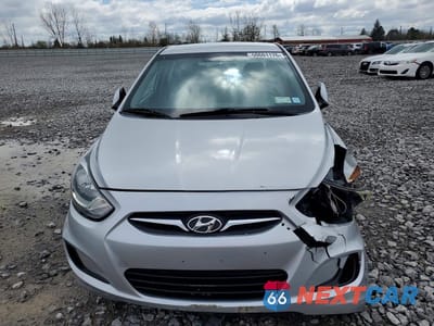 Piąte zdjęcie samochodu w środku: 2013 HYUNDAI ACCENT GLS VIN:KMHCT4AE6DU487334 - miniatura