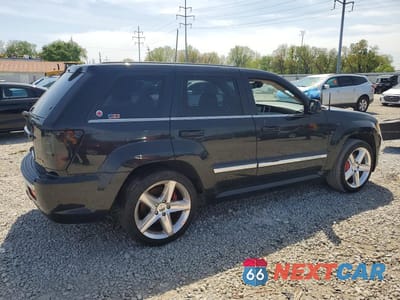 Trzecie zdjęcie samochodu z tyłu: 2009 JEEP GRAND CHEROKEE SRT-8 VIN:1J8HR78W19C542318 - miniatura