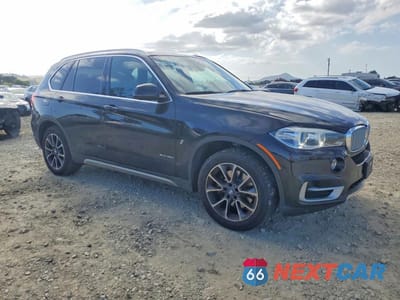 Czwarte zdjęcie samochodu z boku: 2018 BMW X5 XDR40E VIN:5UXKT0C52J0W01479 - miniatura