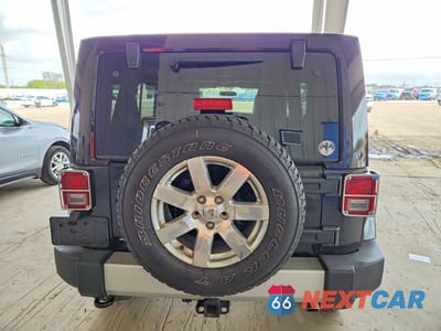 Zdjęcie 6 z 11 samochodu: 2011 JEEP WRANGLER UNLIMITED JEEP 70TH ANNIVERSARY VIN:1J4HA7H16BL591047 - miniatura