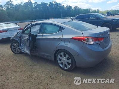Trzecie zdjęcie samochodu z tyłu: 2012 HYUNDAI ELANTRA LIMITED VIN:KMHDH4AE4CU344709 - miniatura