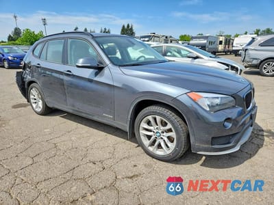 Czwarte zdjęcie samochodu z boku: 2015 BMW X1 XDRIVE28I VIN:WBAVL1C50FVY37186 - miniatura