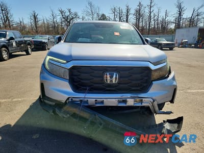 Piąte zdjęcie samochodu w środku: 2023 HONDA PASSPORT EXL VIN:5FNYF8H5XPB025659 - miniatura