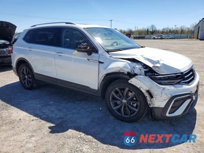 Czwarte zdjęcie samochodu z boku: 2023 VOLKSWAGEN TIGUAN SE VIN:3VVMB7AX0PM025649 - miniatura