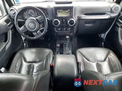 Zdjęcie 8 z 11 samochodu: 2017 JEEP WRANGLER UNLIMITED SAHARA VIN:1C4BJWEG3HL582040 - miniatura