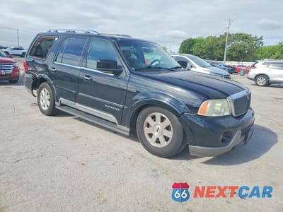 Czwarte zdjęcie samochodu z boku: 2003 LINCOLN NAVIGATOR VIN:5LMFU27R13LJ11988 - miniatura