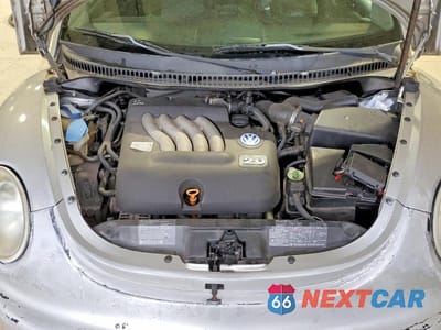 Zdjęcie 11 z 12 samochodu: 2001 VOLKSWAGEN NEW BEETLE GLS VIN:3VWCK21C71M423052 - miniatura