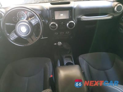 Zdjęcie 8 z 12 samochodu: 2017 JEEP WRANGLER UNLIMITED SAHARA VIN:1C4BJWEG2HL752162 - miniatura