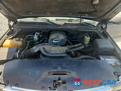 Zdjęcie 12 z 14 samochodu: 2001 CHEVROLET TAHOE C1500 VIN:1GNEC13T21J309366 - miniatura