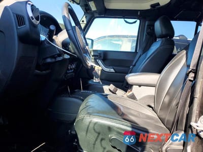 Zdjęcie 7 z 13 samochodu: 2017 JEEP WRANGLER UNLIMITED SAHARA VIN:1C4HJWEG0HL629809 - miniatura