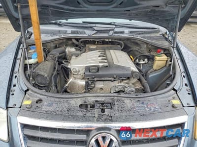 Zdjęcie 12 z 13 samochodu: 2006 VOLKSWAGEN TOUAREG 3.2 VIN:WVGZG77L76D024482 - miniatura