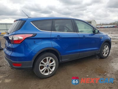 Trzecie zdjęcie samochodu z tyłu: 2017 FORD ESCAPE SE VIN:1FMCU9GD0HUD94419 - miniatura