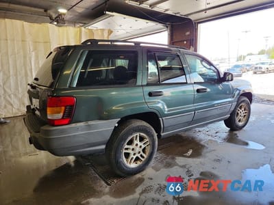 Trzecie zdjęcie samochodu z tyłu: 2002 JEEP GRAND CHEROKEE LAREDO VIN:1J4GW48SX2C232806 - miniatura
