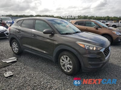 Czwarte zdjęcie samochodu z boku: 2019 HYUNDAI TUCSON SE VIN:KM8J23A40KU986011 - miniatura