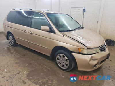 Czwarte zdjęcie samochodu z boku: 2002 HONDA ODYSSEY EX VIN:2HKRL18612H578191 - miniatura