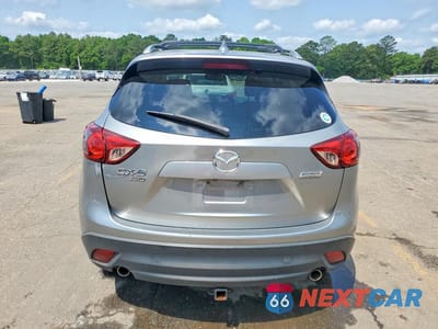 Zdjęcie 6 z 14 samochodu: 2013 MAZDA CX-5 GT VIN:JM3KE4DEXD0100529 - miniatura