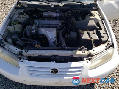 Zdjęcie 11 z 12 samochodu: 1997 TOYOTA CAMRY LE VIN:JT2BG22K9V0010508 - miniatura