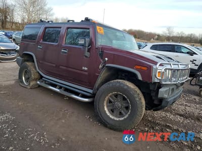 Czwarte zdjęcie samochodu z boku: 2006 HUMMER H2 VIN:5GRGN23U06H118701 - miniatura