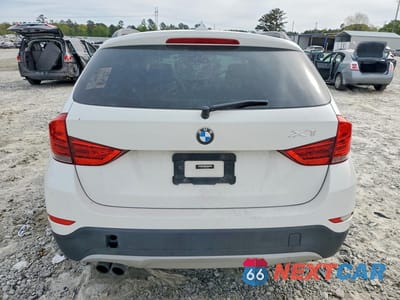 Zdjęcie 6 z 13 samochodu: 2014 BMW X1 VIN:WBAVM1C54EVW52053 - miniatura