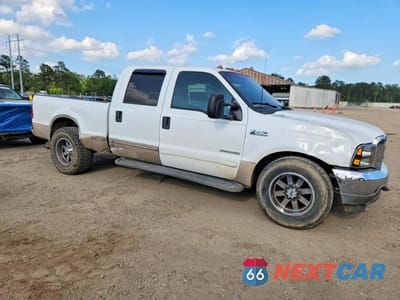 Czwarte zdjęcie samochodu z boku: 1999 FORD F250 SUPER DUTY VIN:1FTNW20L8XEA96113 - miniatura