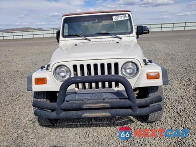 Piąte zdjęcie samochodu w środku: 1997 JEEP WRANGLER / TJ SE VIN:1J4FY29P3VP418690 - miniatura
