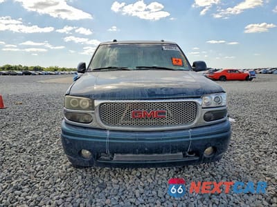 Piąte zdjęcie samochodu w środku: 2005 GMC YUKON DENALI VIN:1GKEK63U05J243234 - miniatura