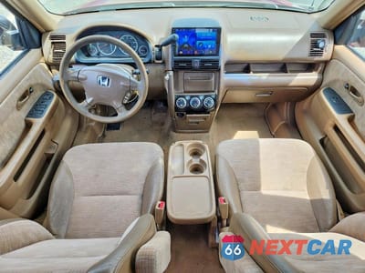 Zdjęcie 8 z 13 samochodu: 2004 HONDA CR-V LX VIN:JHLRD68434C020028 - miniatura