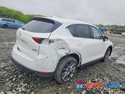 Trzecie zdjęcie samochodu z tyłu: 2021 MAZDA CX-5 GRAND TOURING VIN:JM3KFBDM1M1493467 - miniatura