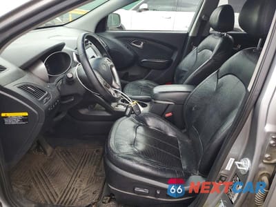 Zdjęcie 7 z 13 samochodu: 2013 HYUNDAI TUCSON LIMITED VIN:KM8JUCAC6DU690592 - miniatura