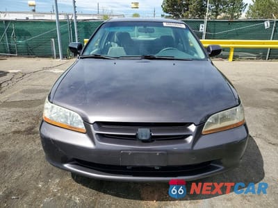 Piąte zdjęcie samochodu w środku: 1999 HONDA ACCORD LX VIN:JHMCG5643XC021075 - miniatura