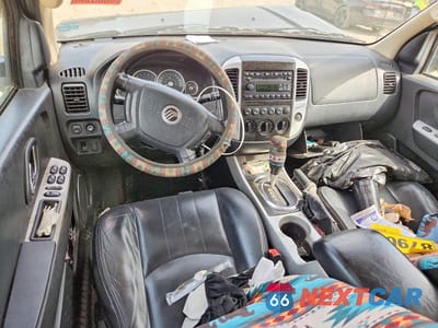 Zdjęcie 8 z 14 samochodu: 2005 MERCURY MARINER VIN:4M2CU57165DJ31005 - miniatura