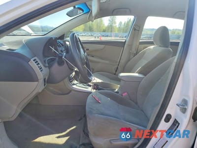Zdjęcie 7 z 12 samochodu: 2009 TOYOTA COROLLA LE VIN:JTDBL40E999089045 - miniatura