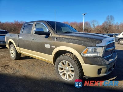 Czwarte zdjęcie samochodu z boku: 2014 RAM 1500 LONGHORN VIN:1C6RR7PT9ES253617 - miniatura