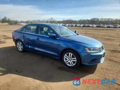 Czwarte zdjęcie samochodu z boku: 2017 VOLKSWAGEN JETTA S VIN:3VW2B7AJ2HM213508 - miniatura