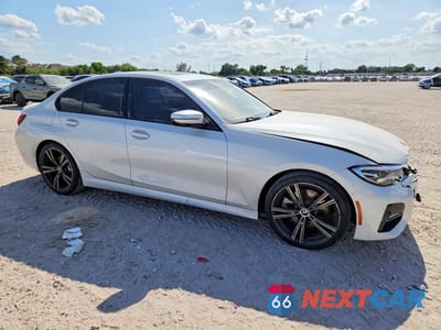Czwarte zdjęcie samochodu z boku: 2021 BMW 330I VIN:3MW5R1J02M8C18207 - miniatura