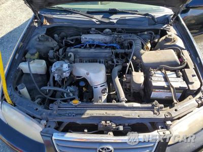 Zdjęcie 21 z 24 samochodu: 2000 TOYOTA CAMRY LE VIN:JT2BG22K1Y0398774 - miniatura