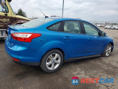 Trzecie zdjęcie samochodu z tyłu: 2013 FORD FOCUS SE VIN:1FADP3F29DL261287 - miniatura