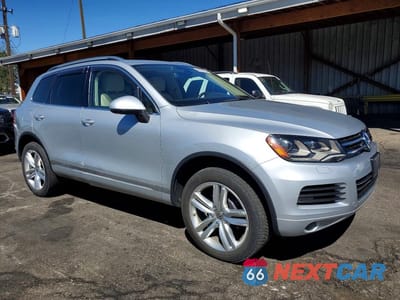 Czwarte zdjęcie samochodu z boku: 2011 VOLKSWAGEN TOUAREG V6 VIN:WVGFF9BP3BD004929 - miniatura