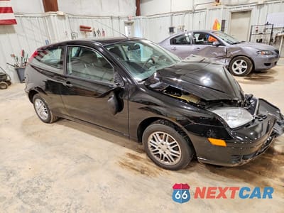 Czwarte zdjęcie samochodu z boku: 2006 FORD FOCUS ZX3 VIN:1FAFP31N86W152721 - miniatura