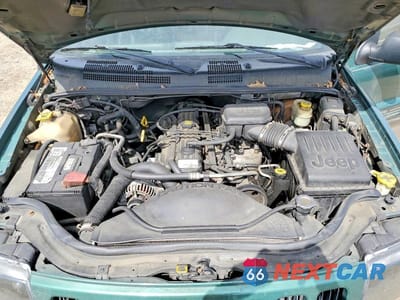 Zdjęcie 12 z 13 samochodu: 2000 JEEP GRAND CHEROKEE LIMITED VIN:1J4GW58S2YC140605 - miniatura