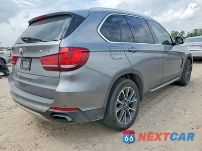 Trzecie zdjęcie samochodu z tyłu: 2014 BMW X5 XDRIVE50I VIN:5UXKR6C50E0C03214 - miniatura