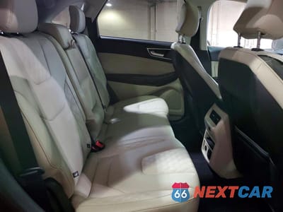 Zdjęcie 11 z 14 samochodu: 2024 FORD EDGE TITANIUM VIN:2FMPK4K98RBA23089 - miniatura