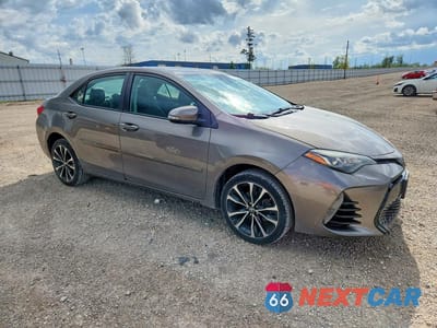 Czwarte zdjęcie samochodu z boku: 2018 TOYOTA COROLLA SE VIN:5YFBURHE3JP783534 - miniatura