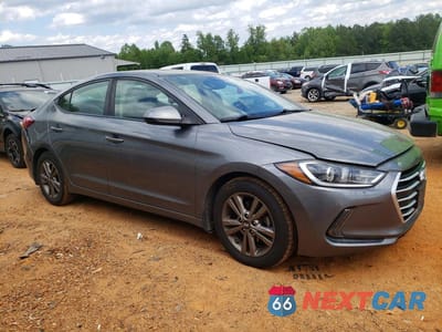 Czwarte zdjęcie samochodu z boku: 2018 HYUNDAI ELANTRA VALUE EDITION VIN:5NPD84LF1JH357029 - miniatura