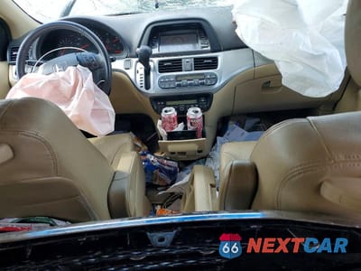 Zdjęcie 8 z 13 samochodu: 2010 HONDA ODYSSEY EXL VIN:5FNRL3H78AB028391 - miniatura